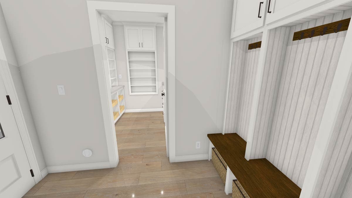 A hallway opens to a pantry. A built-in bench and cubbies line the right wall, with hooks and cabinets above.