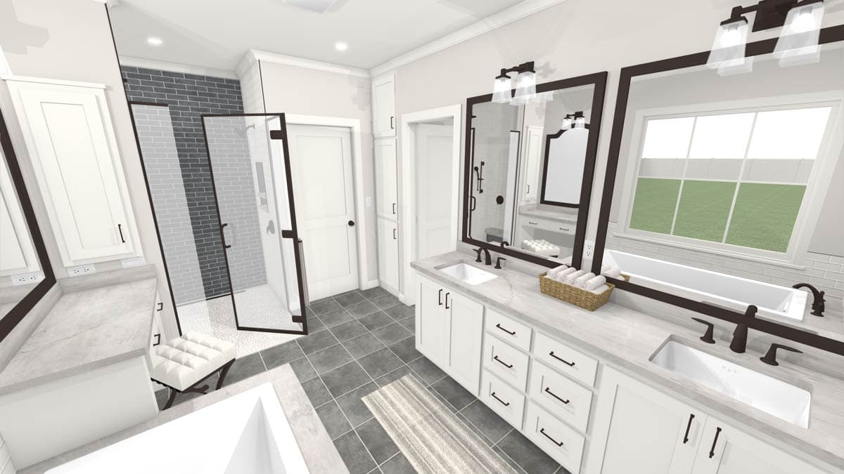 Spacious, modern bathroom featuring a walk-in shower, double vanity, and a large window overlooking a yard.
