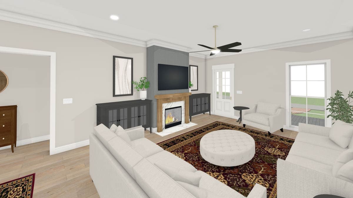 A modern living room with a fireplace, TV, and two matching cabinets flanking it. A large area rug sits beneath the light-colored furniture.