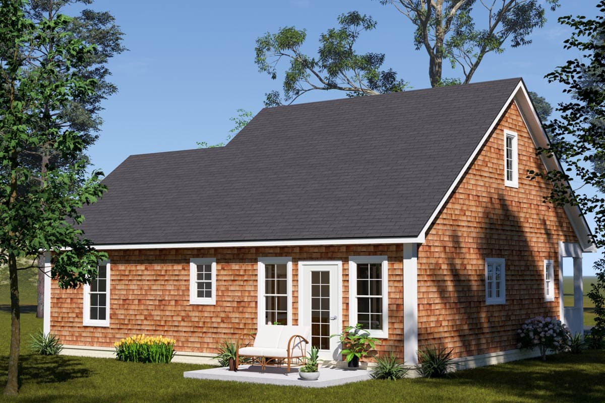 House plan exterior: One-and-a-half story cottage with cedar shingles, gable dormer, and rear patio access.