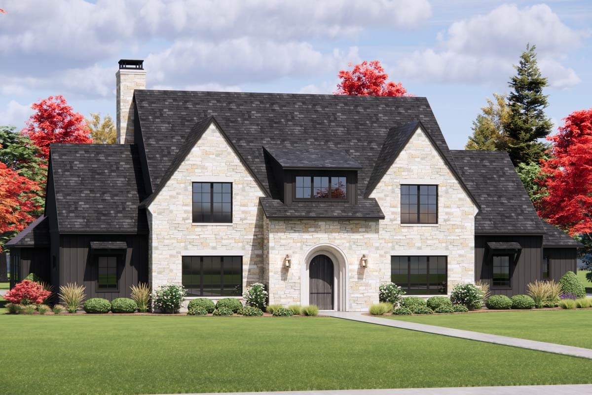 House plan exterior: Two-story Tudor style with stone facade, dark vertical siding, prominent gables, dormer, and arched entry.