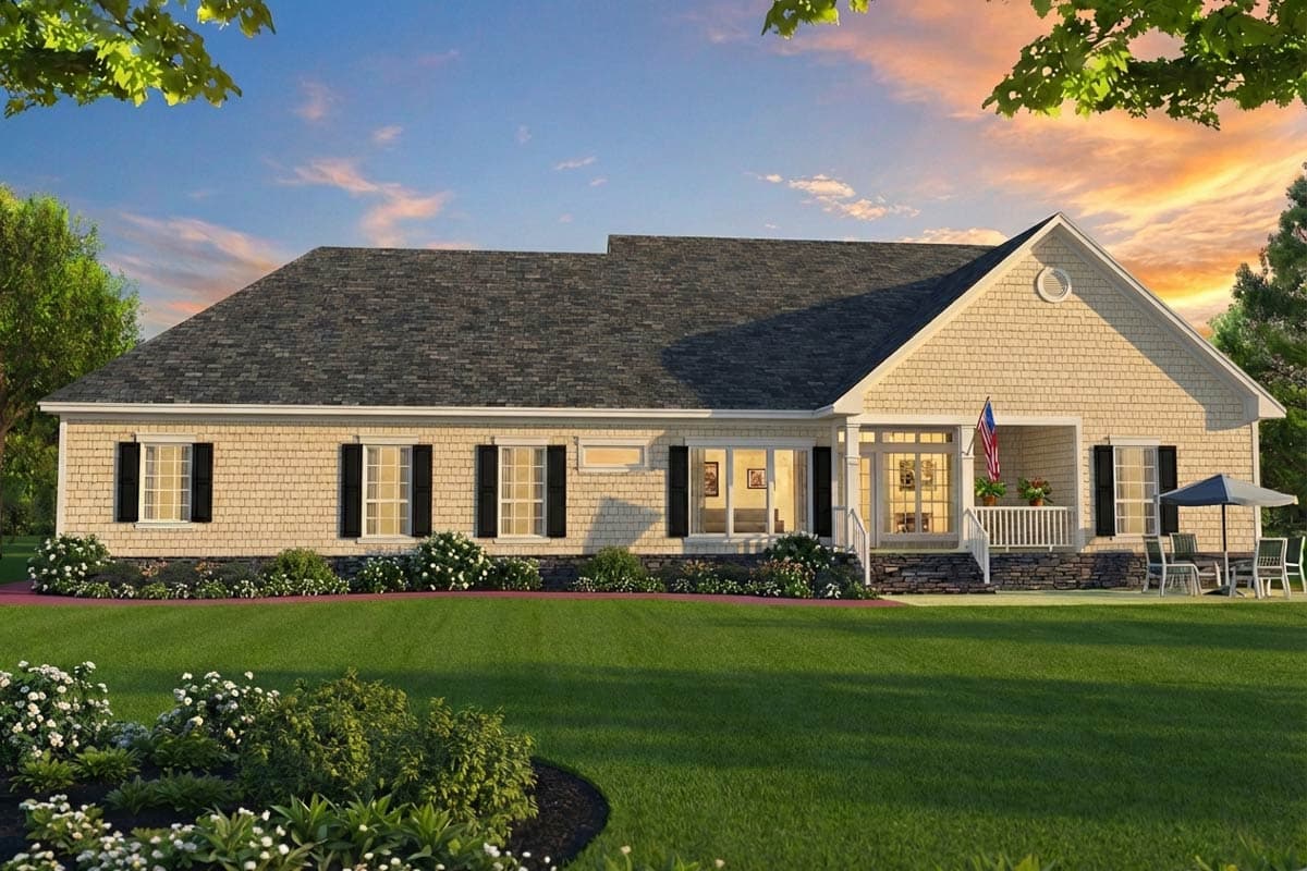 House plan exterior: Ranch style, one story, featuring a covered front porch with railing, shaker siding, and multiple windows.