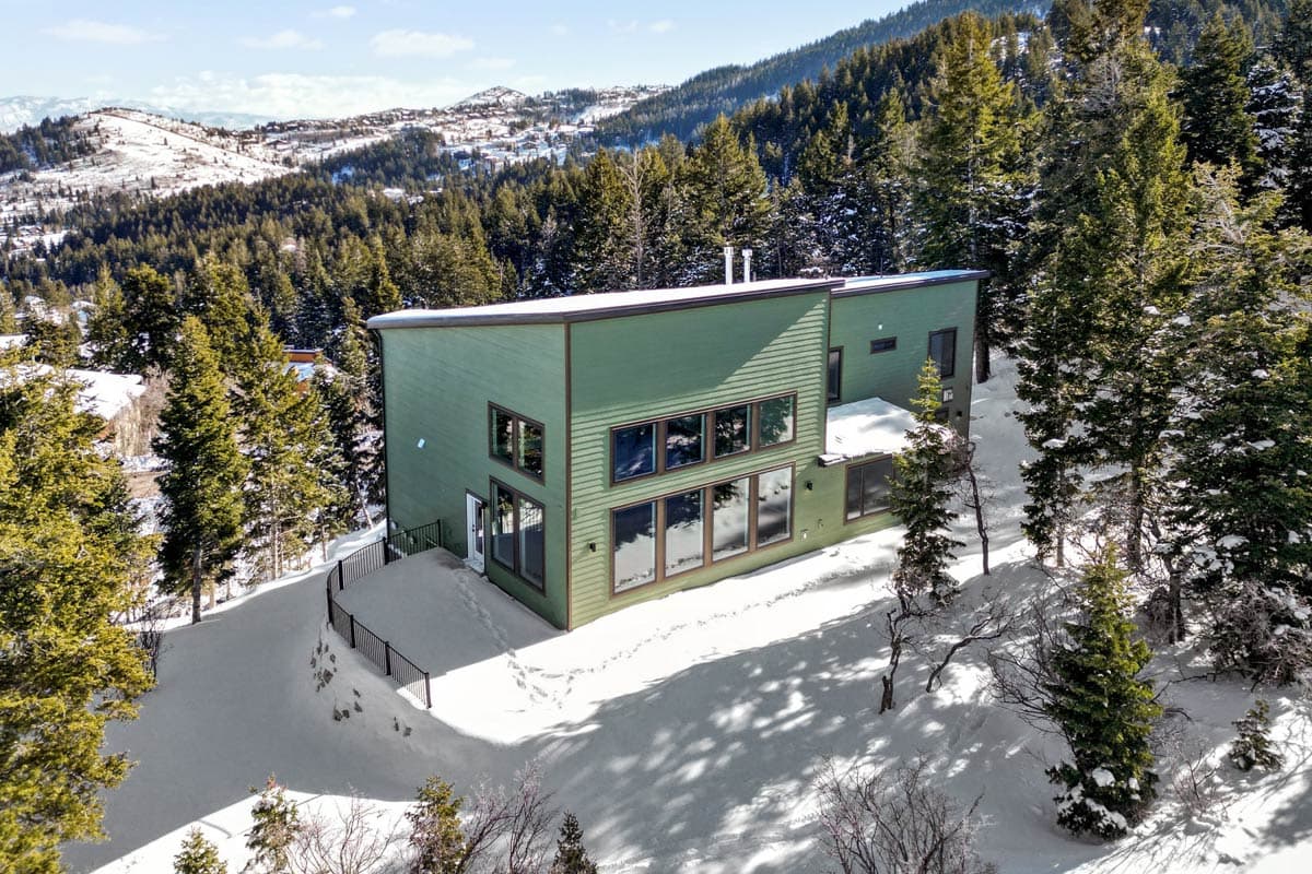 Plan 849052PGE: Expansive 5-Bedroom Mountain House Plan with Elevator and Two-Story Great Room - Image #7 - Contemporary, Mountain, Northwest