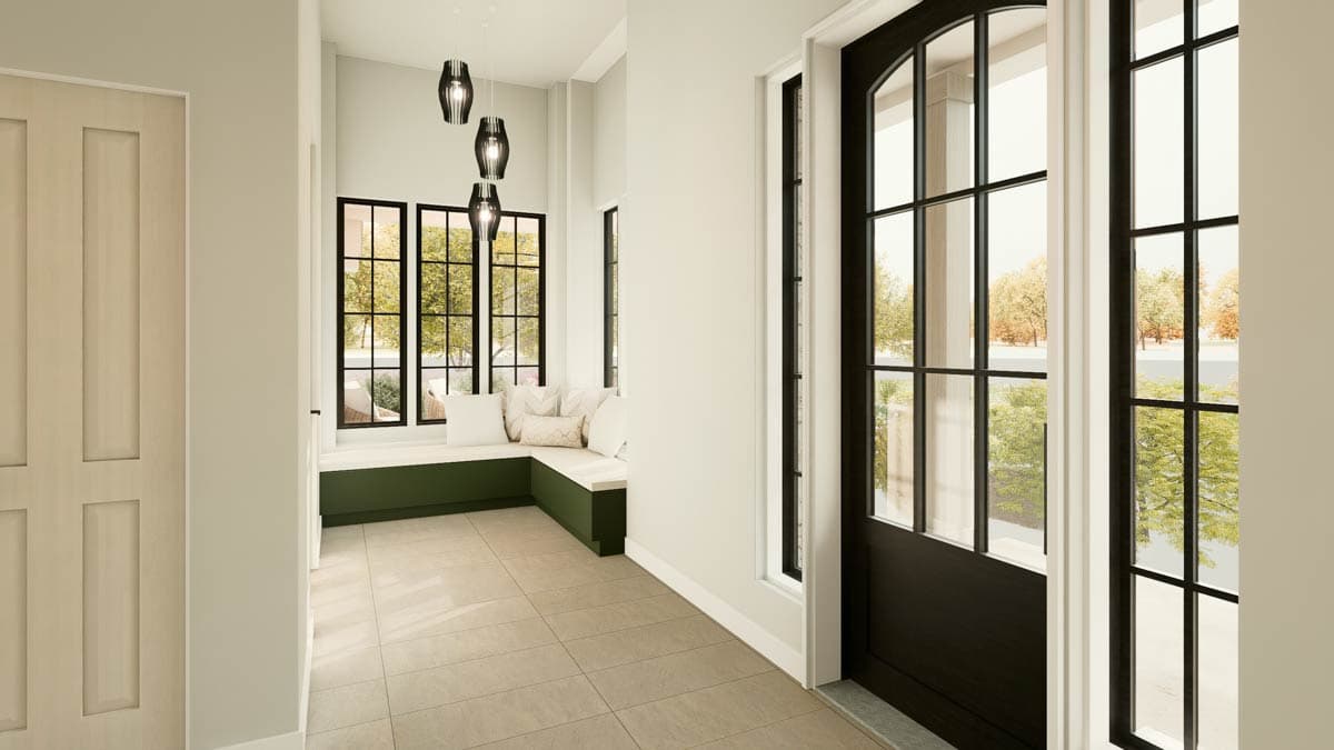 Interior view: Entryway with tiled floor, built-in window bench, and black-paned windows.