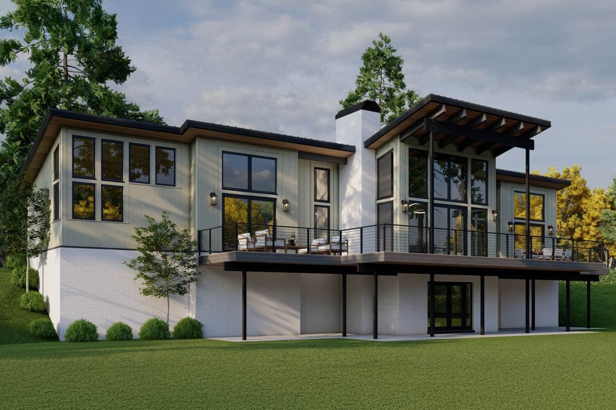 House plan exterior. Two-story Modern house with a prominent chimney, upper-level deck, and black-framed windows. White brick foundation.