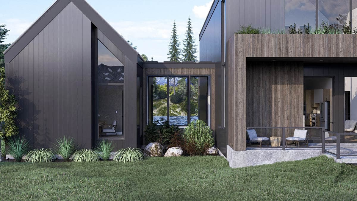 Modern house exterior with dark siding, wood accents, large windows, and a covered patio.
