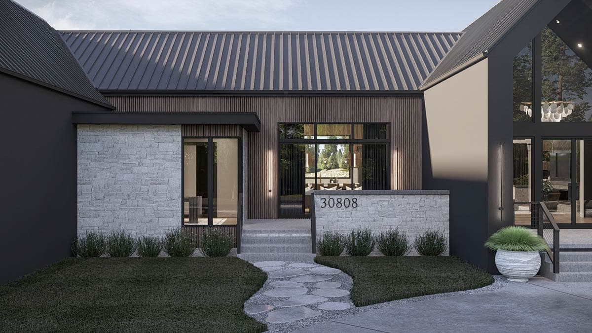 Modern house plan exterior with stone and wood facade, metal roof, large windows, and walkway with stone pavers.