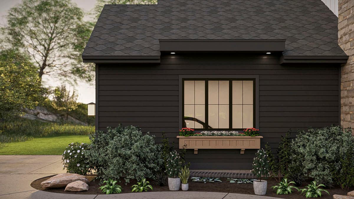 House plan exterior with dark horizontal siding, large multi-pane window with planter box, and stone accent.