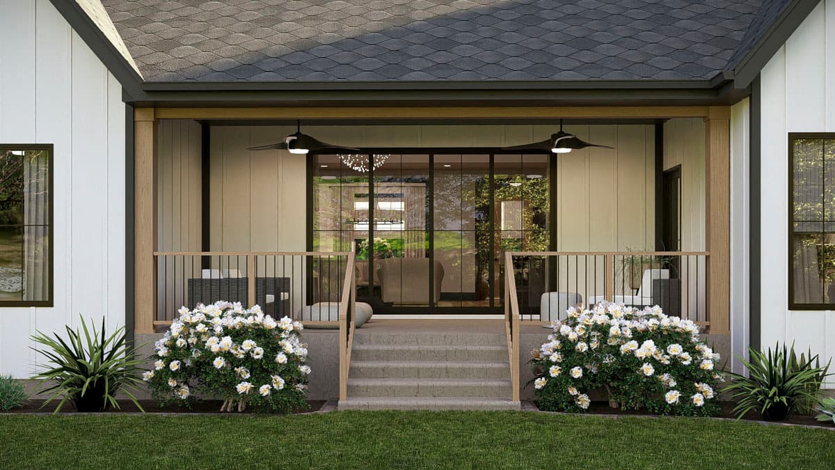 House plan exterior: Modern farmhouse style, covered porch with wood posts, railing, and large sliding glass doors.