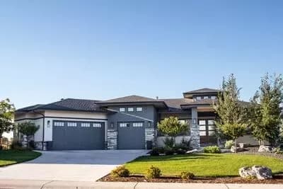 Modern House Plan with Angled 3-Car Garage and Optional Home Theater