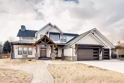 Expansive Modern Farmhouse House Plan with Master on Main and Two-Story Great Room