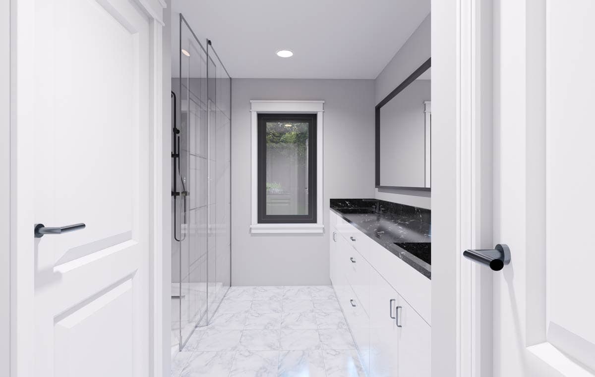Modern bathroom with glass-enclosed shower, double vanity with black countertop, and a single window.