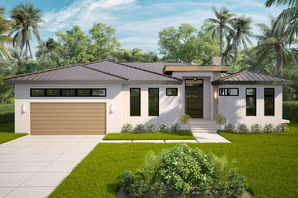 Modern, single-story house with a tan garage door, dark-framed windows, and a stone facade entrance, set in a tropical environment.