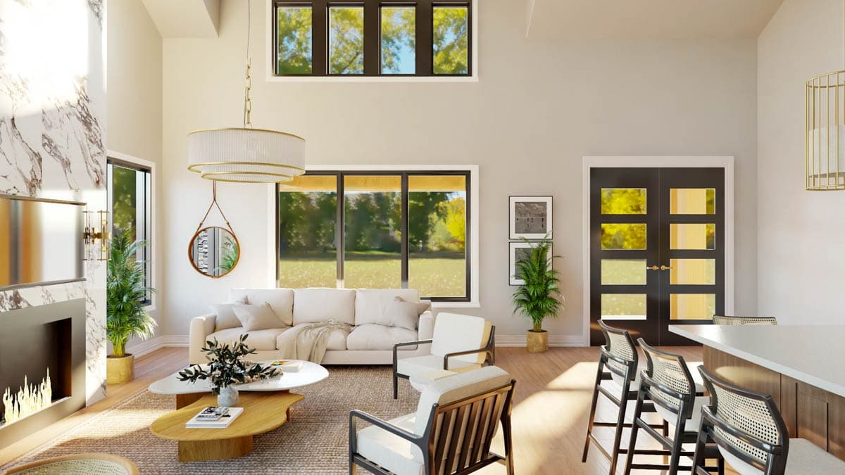 A modern, open-concept living room with a large sofa, fireplace, and windows overlooking a green outdoor space.