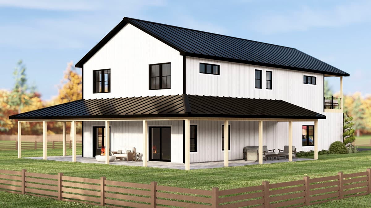 Modern two-story house with white siding, black roof, and wrap-around porch. A low wooden fence surrounds the grassy yard in front of the house.