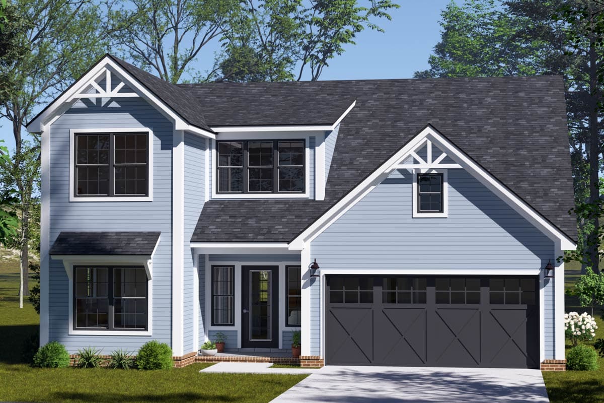 A two-story blue house with a dark gray roof and garage door. White trim accents the windows and gables. Landscaping surrounds the house.