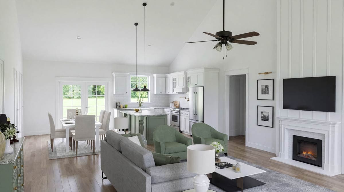 Open concept living area with vaulted ceiling, fireplace, kitchen island, and dining space.