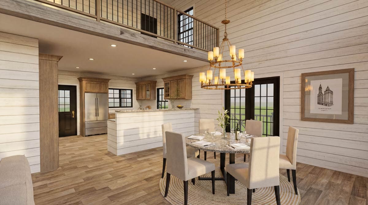 House plan interior: Dining area with chandelier and table, open to kitchen with island and stainless steel refrigerator.