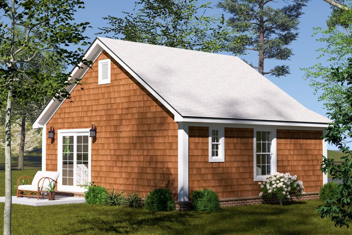 House plan exterior view of one-story home with wood shingle siding, white trim, gabled roof, and double French doors.