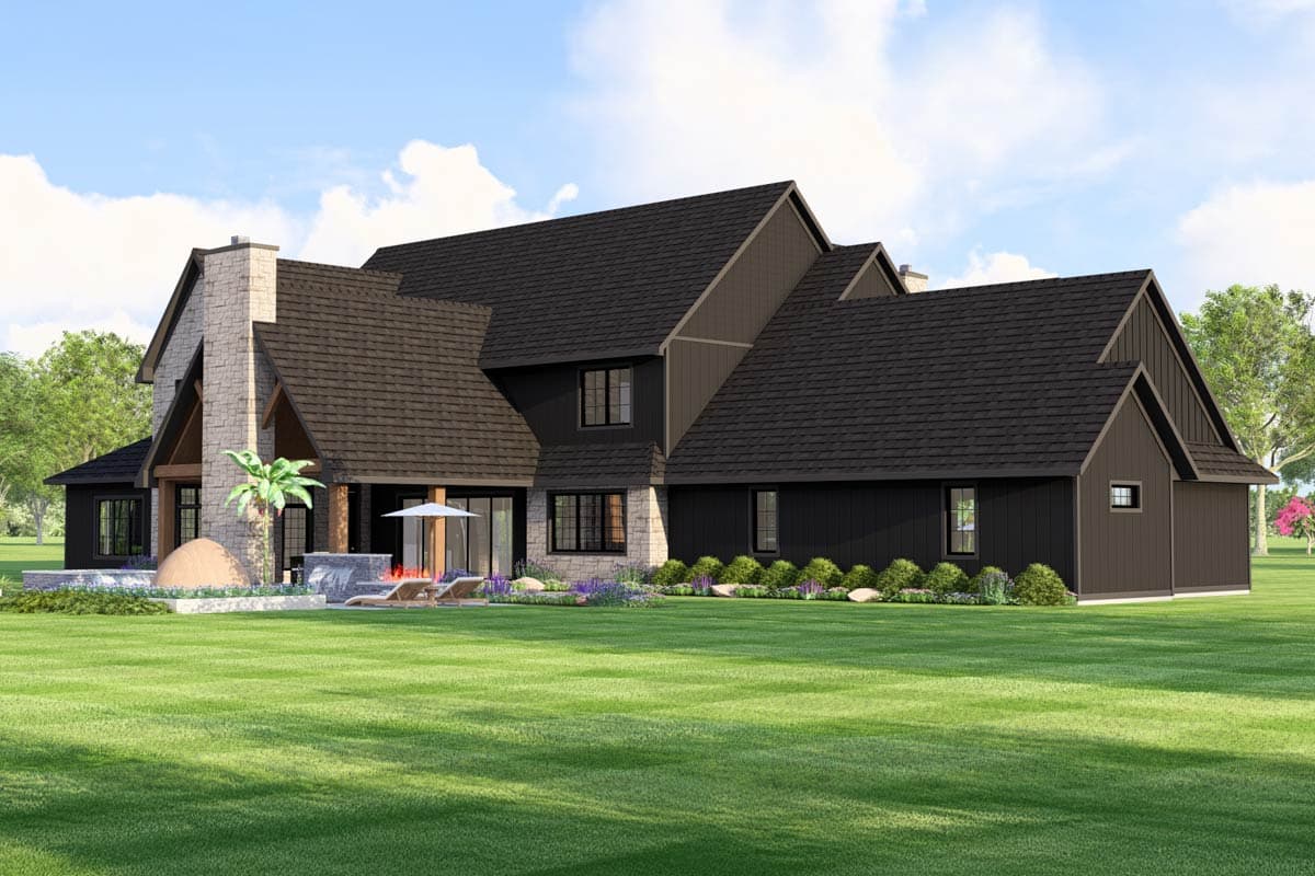 House plan exterior: Modern Farmhouse style, two stories, stone chimney, dark siding, gables, and covered patio.