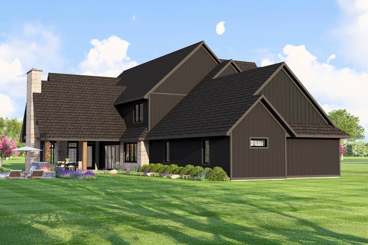 House plan exterior featuring stone chimney, covered patio with outdoor seating, board and batten siding, and multiple gables.