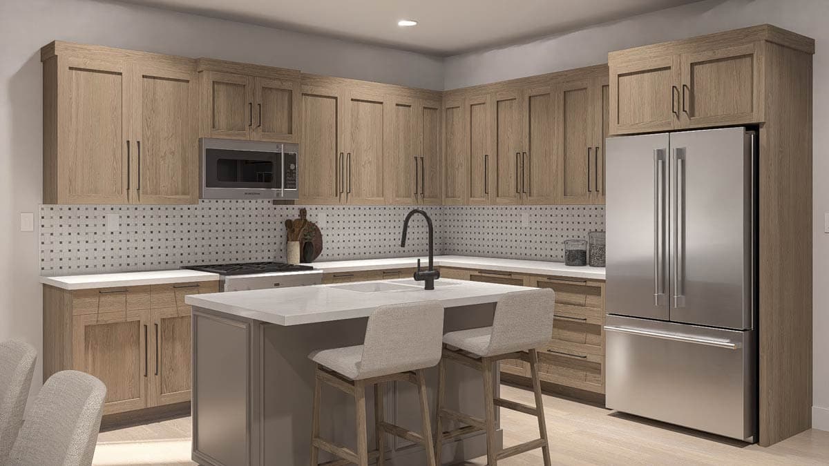 Kitchen interior with light wood cabinets, stainless steel appliances, a central island with seating, and a patterned backsplash.