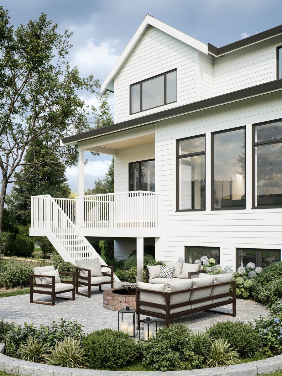 House plan exterior. Two-story Modern Farmhouse with gabled roof, large windows, and an elevated porch. Includes outdoor living space with seating.