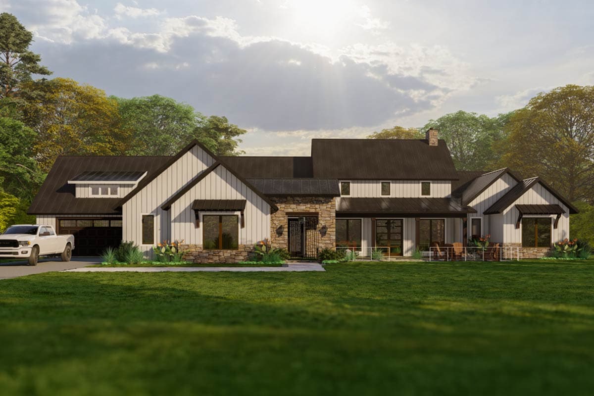 Modern Farmhouse house plan exterior with white vertical siding, stone accents, metal roof, gables, and a side-entry garage.