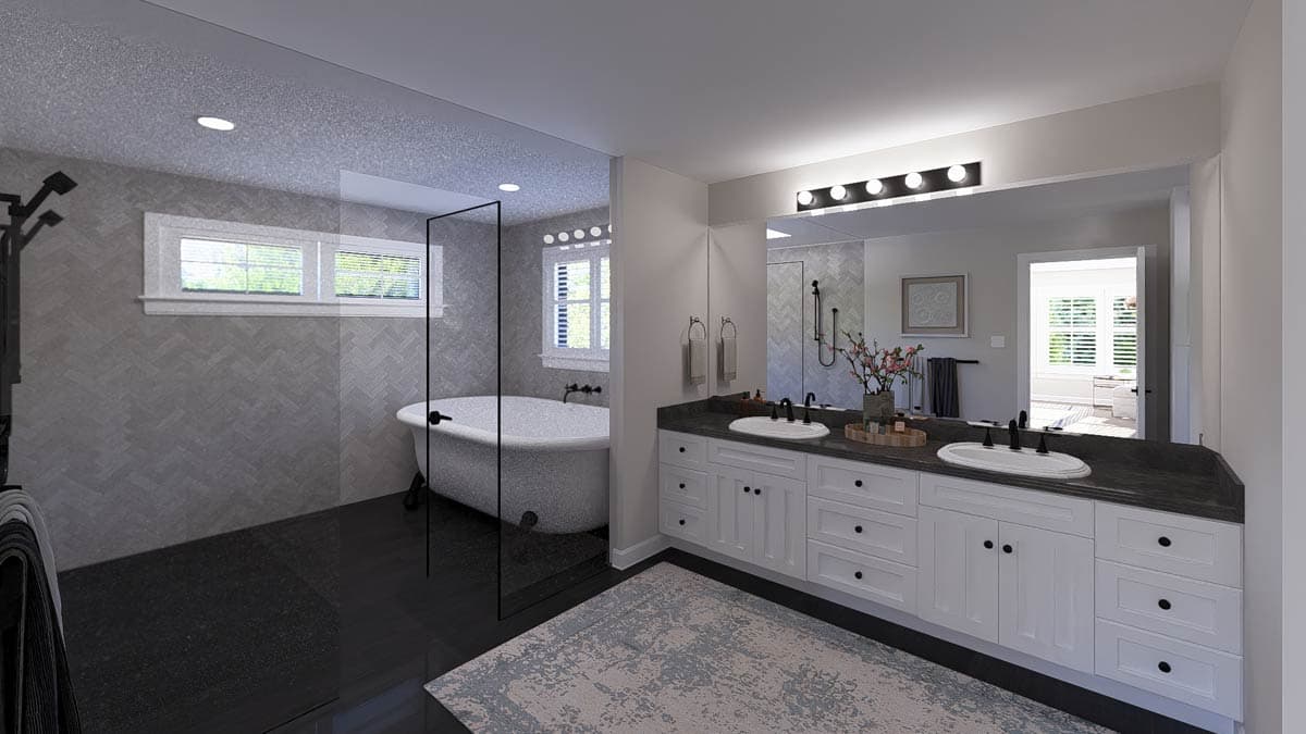 Bathroom with freestanding tub, glass-enclosed shower, double vanity with dark countertop, and black fixtures.