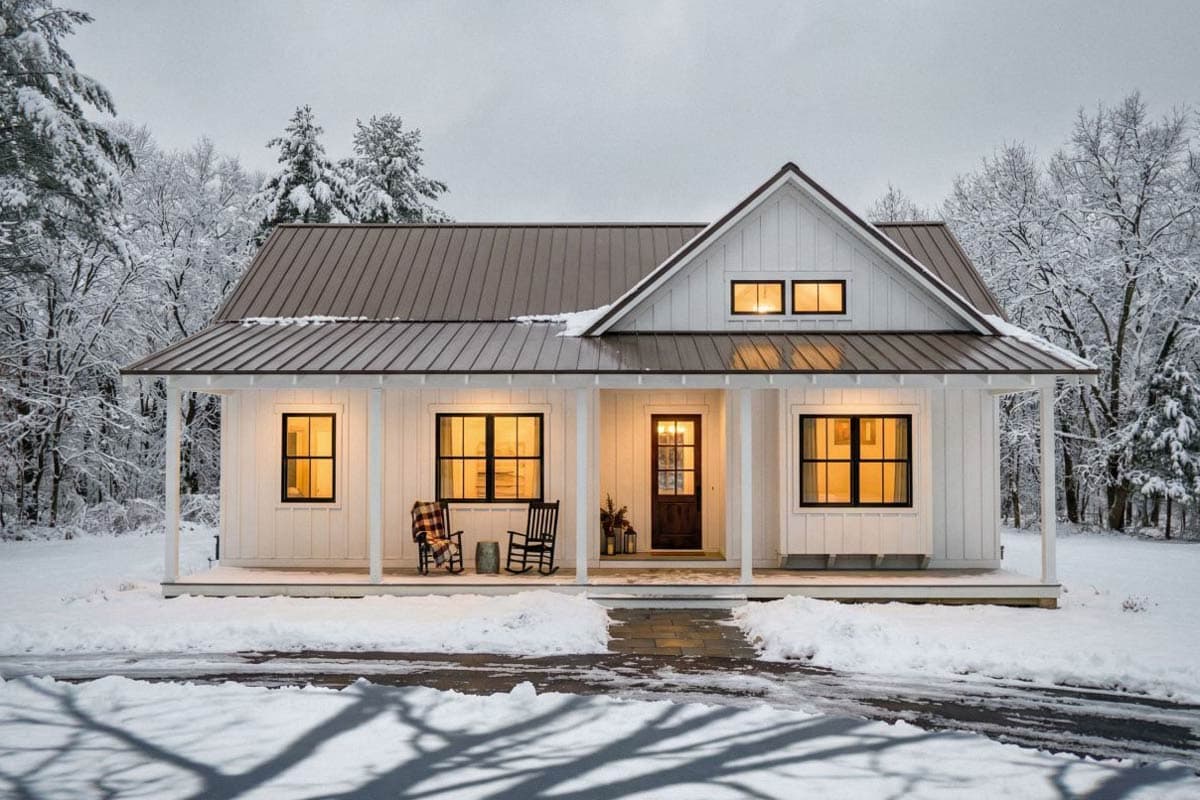 Modern Farmhouse house plan exterior with wraparound porch, metal roof, gabled dormer, and board and batten siding.