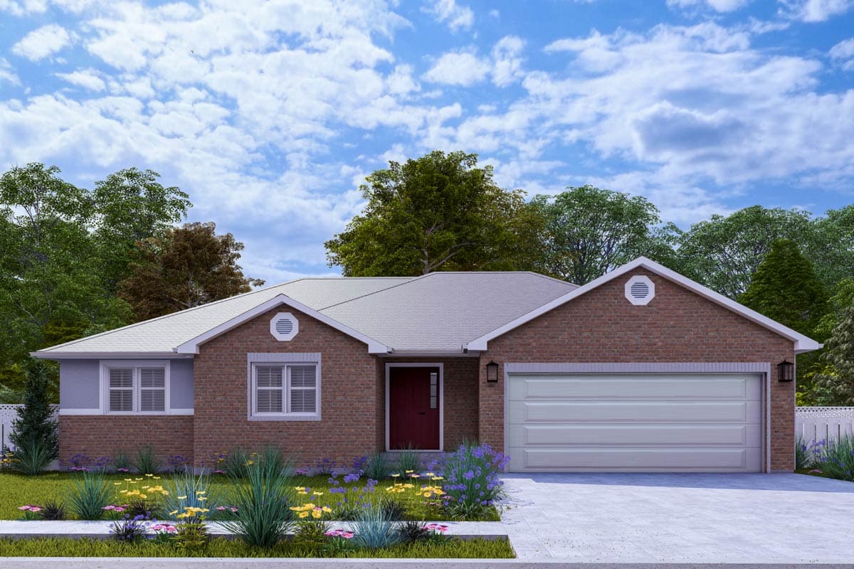 A brick single-story home with a two-car garage, red front door, and a well-manicured lawn with colorful flowers under a bright, cloudy sky.