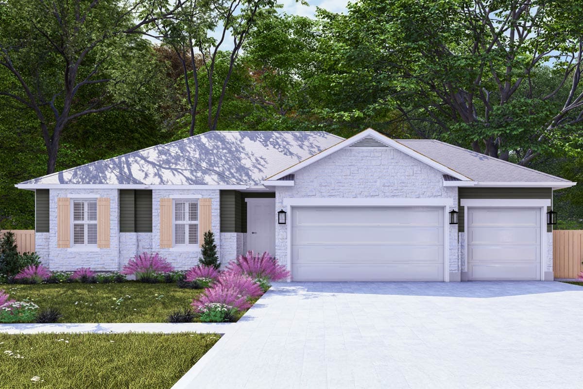 A modern, single-story house with a white stone facade and a two-car garage. Pink flowers line the front walkway leading to the home.
