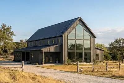 Contemporary Barndominium House Plan with Two-Story Great Room and 4-Car Garage