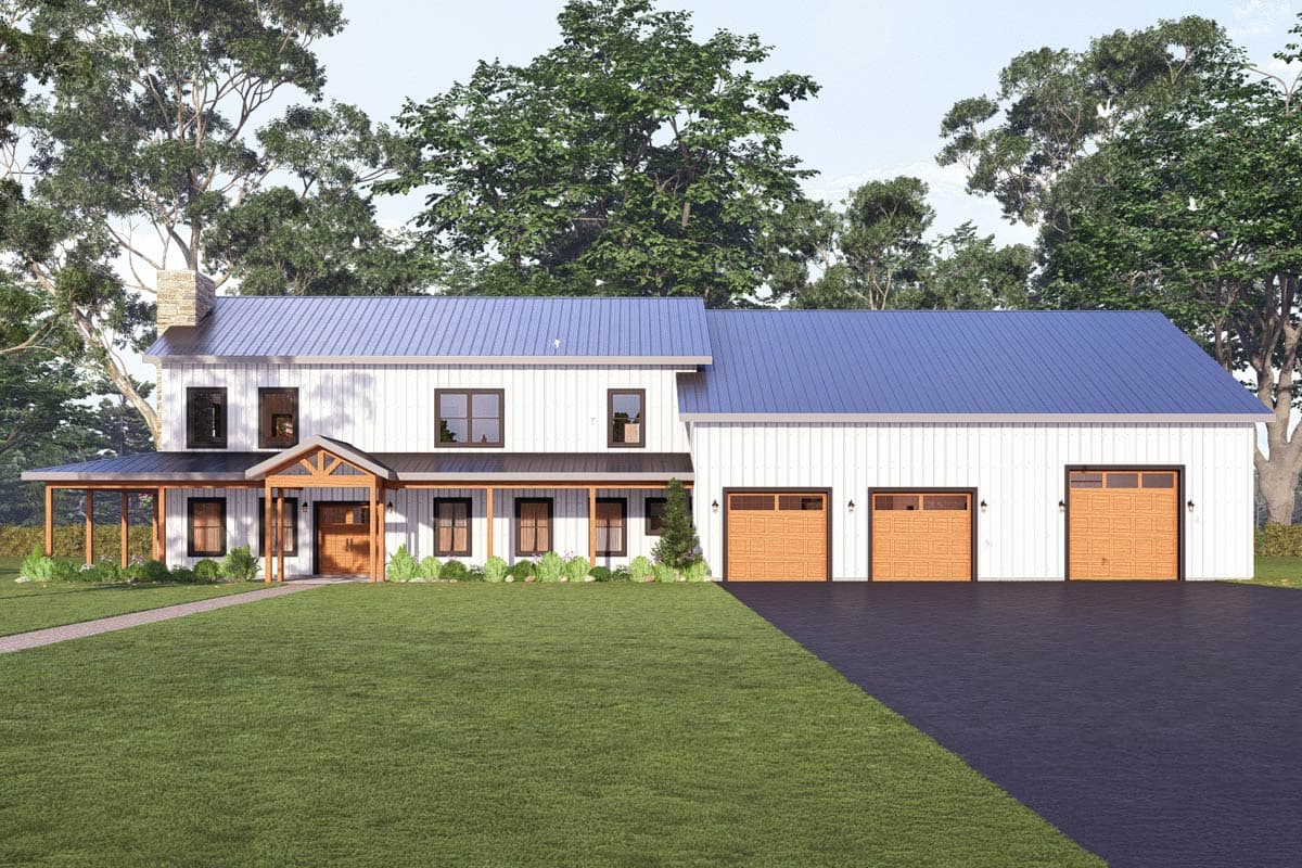A two-story white farmhouse with a blue metal roof, attached three-car garage, and a covered front porch, set on a green lawn.