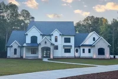 Elegant European Farmhouse House Plan with Main Level Master and In-Law Suite