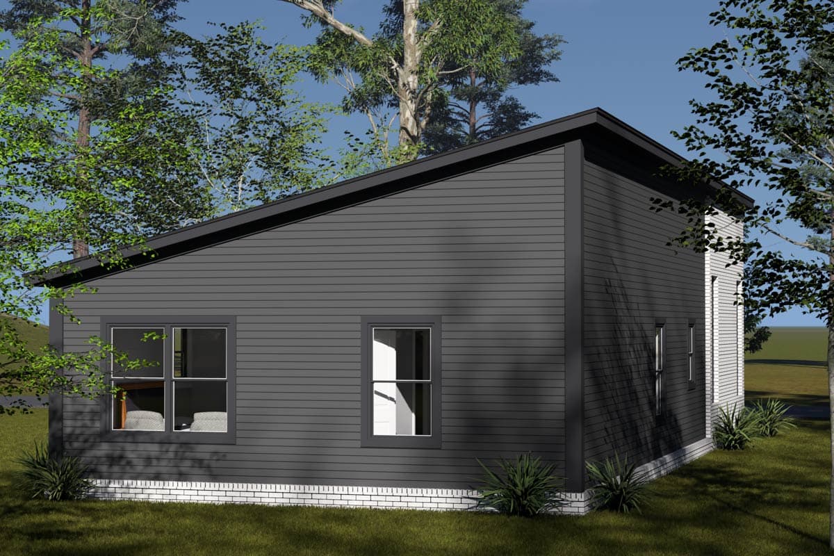 House plan exterior with dark horizontal siding, a low-pitch roof, and brick foundation. Two windows visible.