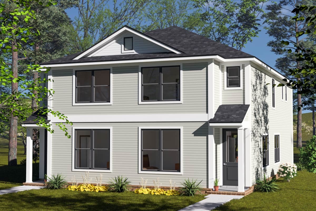 A two-story house with light gray siding and black-framed windows is surrounded by trees. The front porch has a dark door.