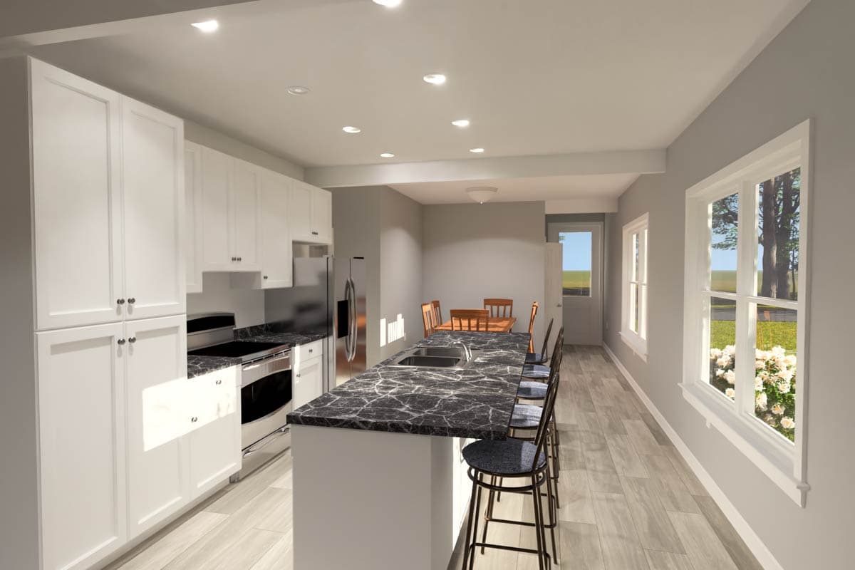 Contemporary kitchen with white cabinets, granite island, stainless steel appliances, and adjacent dining area.
