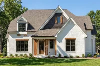 Elegant 3-Bedroom European Craftsman House Plan with Two-Story Great Room