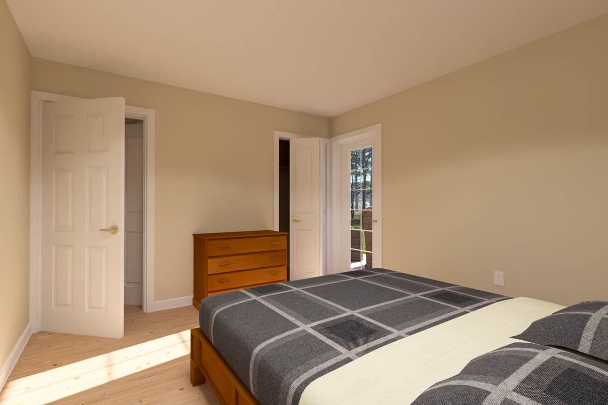 Interior view of a bedroom with a bed, dresser, and two doors, one leading to a closet and another to an exterior.