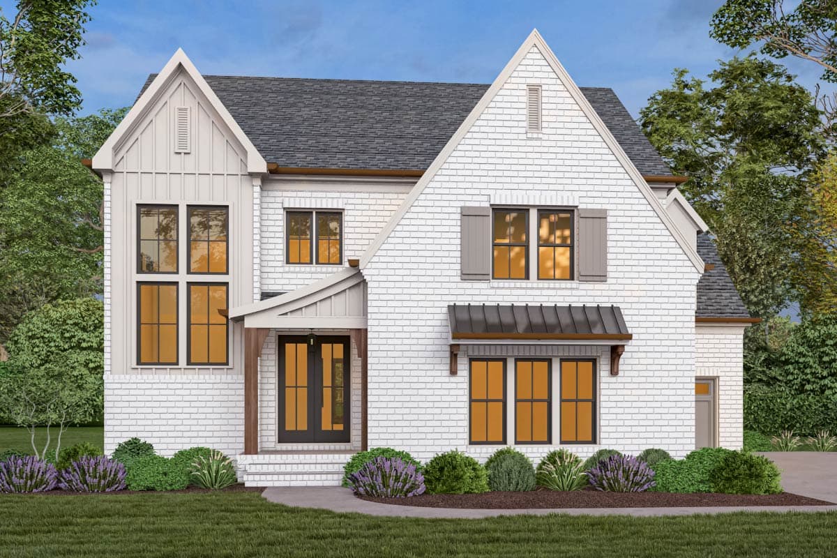 A modern white brick house with dark window frames and a gray roof sits amidst green landscaping under a blue sky, showcasing curb appeal.