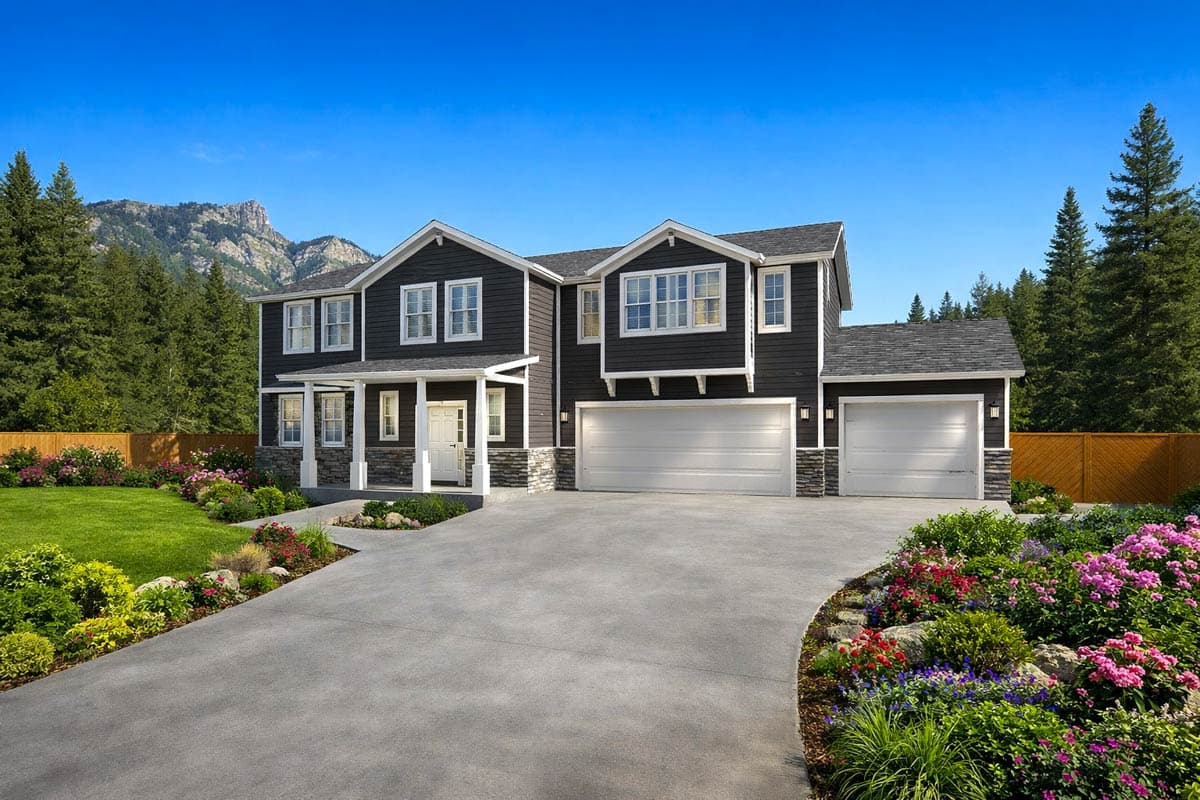 House plan exterior: two-story dark siding home with white-trimmed windows, covered front porch, stone accents, and attached three-car garage.