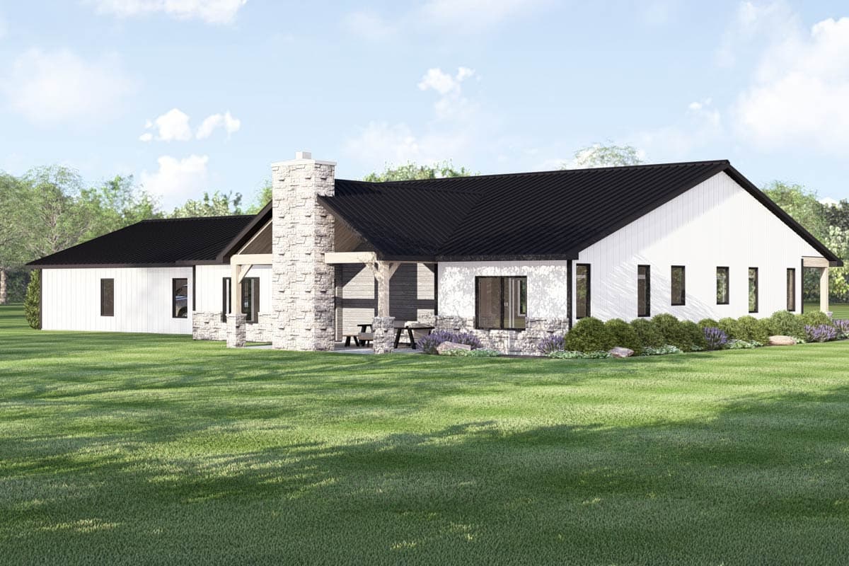 Modern farmhouse house plan exterior with white vertical siding, stone chimney, black metal roof, and gabled dormers.