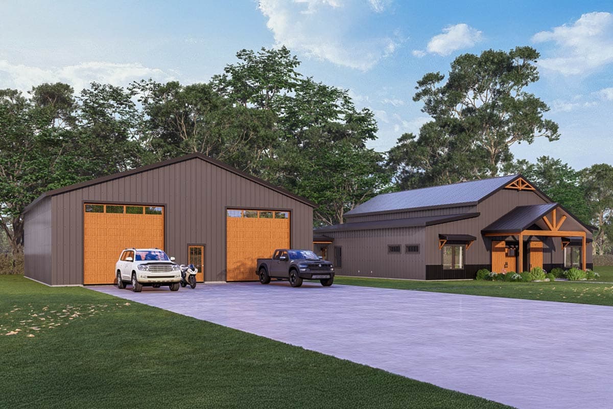 A modern building with garage doors next to a smaller house-like structure. Cars and a motorcycle are parked on the large concrete driveway.