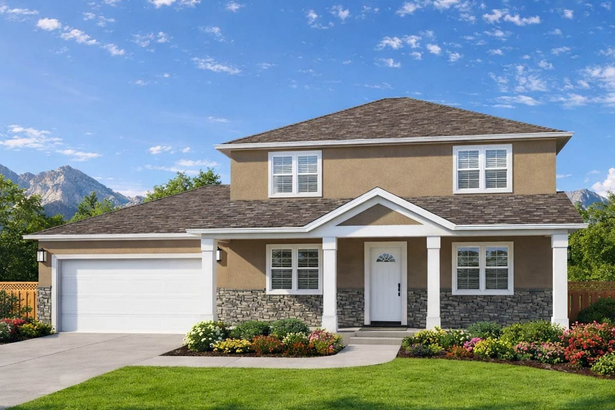 A two-story home with a brown exterior and white trim sits under a blue sky, mountain background. A well-manicured lawn and garden is in front.
