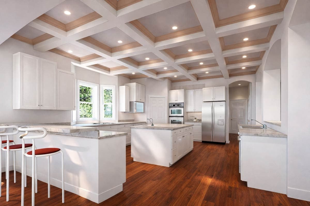 Kitchen with white cabinets, island with sink, perimeter counters, stainless steel appliances, and a coffered ceiling with wood trim.