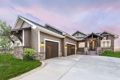 Luxury Craftsman Ranch House Plan with Split Bedrooms and Angled 3-Car Garage