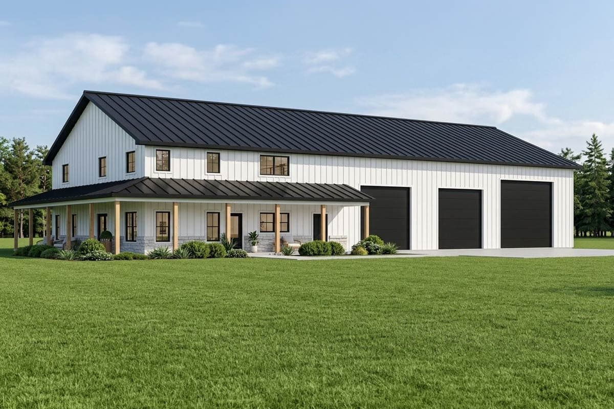 Modern farmhouse with black roof, white siding, and a large porch, set in a grassy yard under a blue sky.