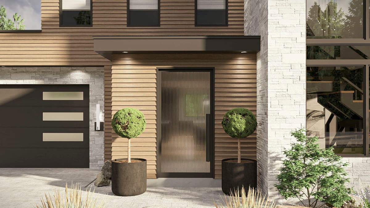 Modern house exterior with wood siding, stone facade, multi-panel garage door, and frosted glass entry door.