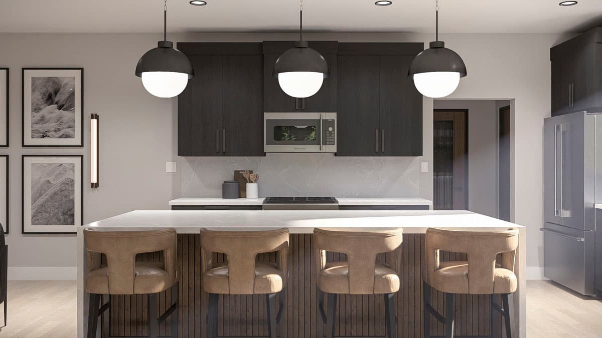 Modern kitchen with dark wood cabinets, island seating, and stainless steel appliances.